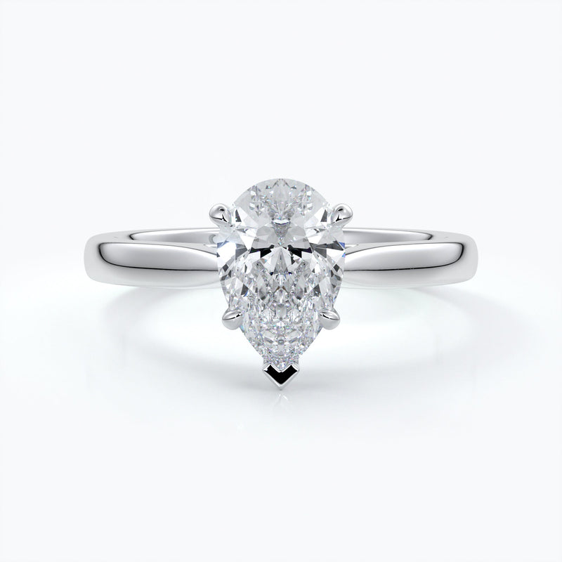 Silver ring with a pear-shaped diamond
