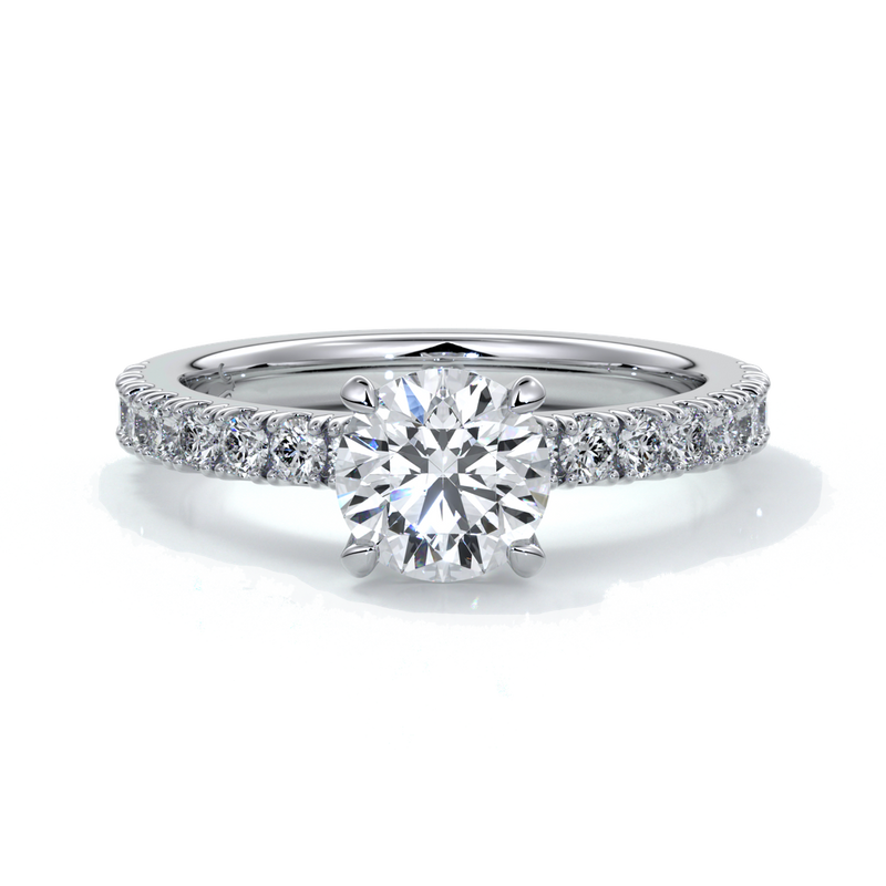Platinum ring with round diamonds and diamonds on the band