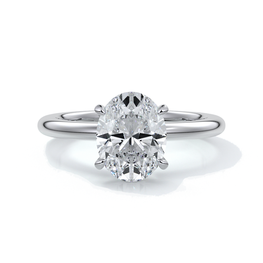 Platinum ring featuring a two carat oval diamond secured with four claws