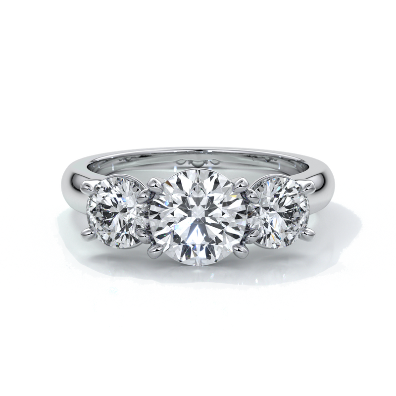 Platinum ring with a trilogy of round diamonds with a cathedral setting