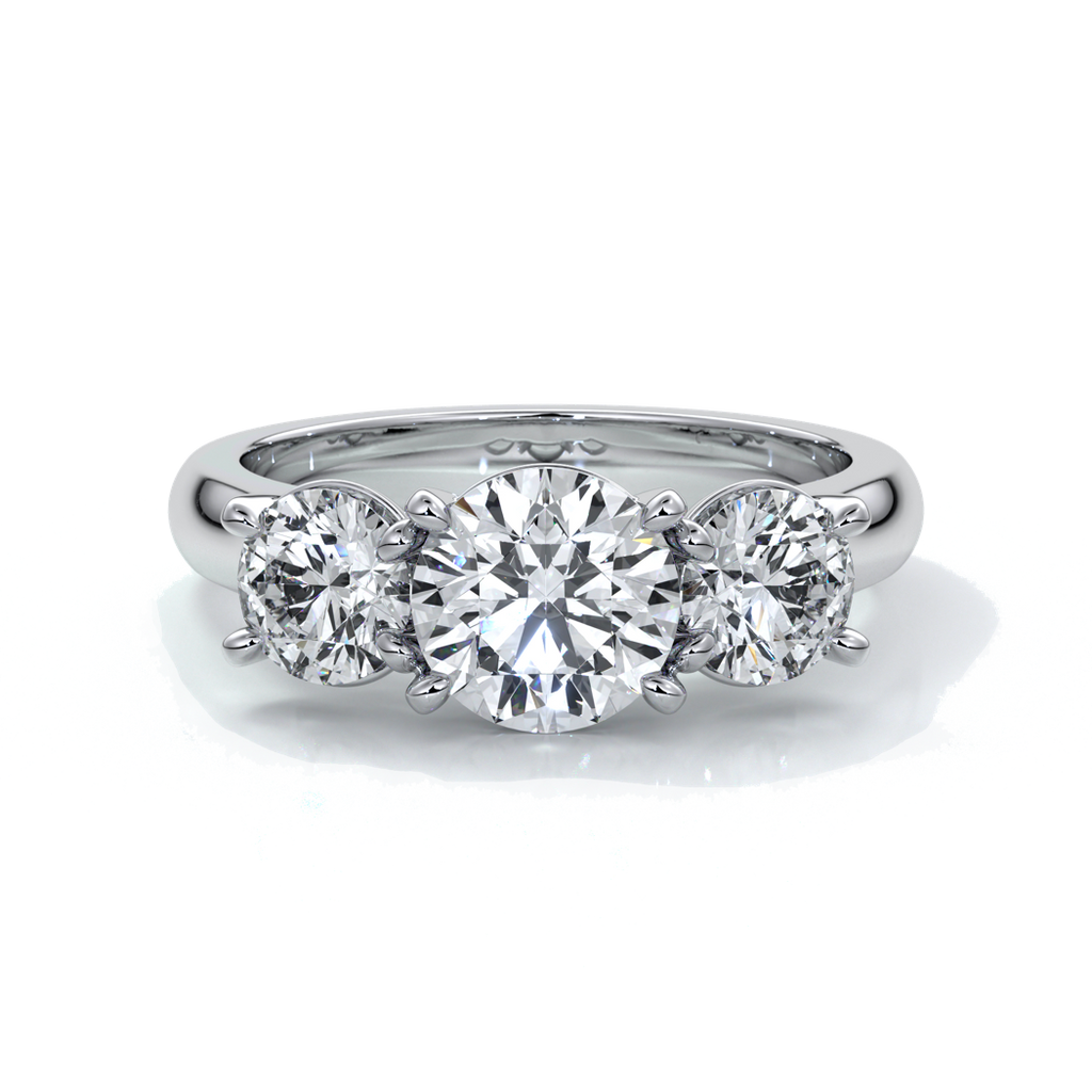 Platinum ring with a trilogy of round diamonds with a cathedral setting