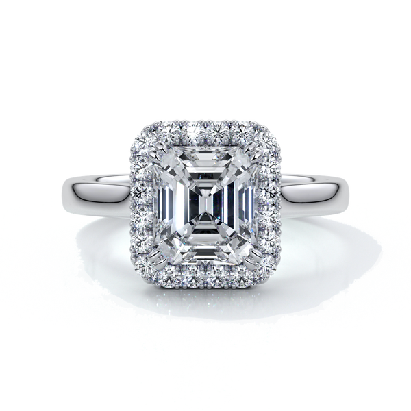 Platinum emerald cut diamond ring with a cathedral setting
