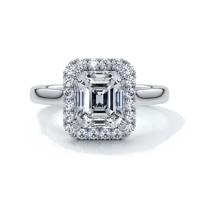 Platinum emerald cut diamond ring with a cathedral setting