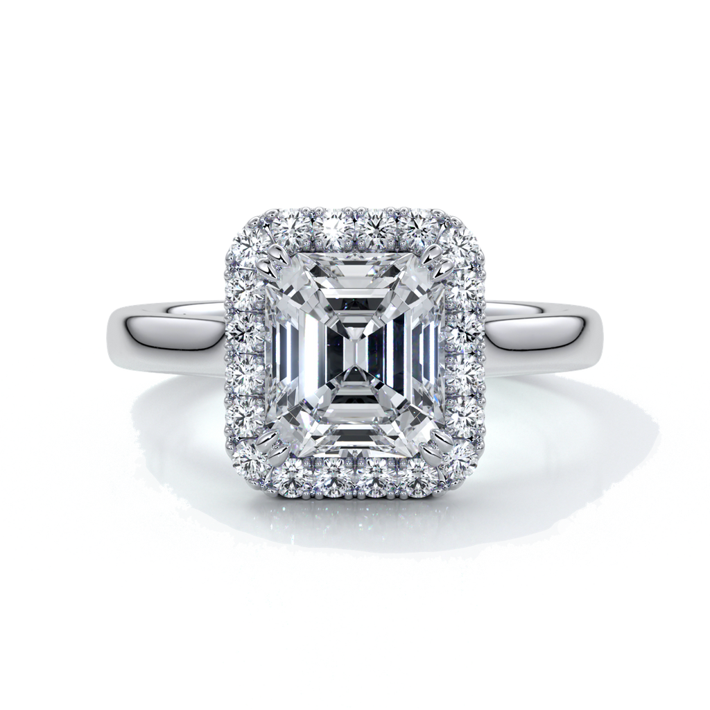 Platinum emerald cut diamond ring with a cathedral setting