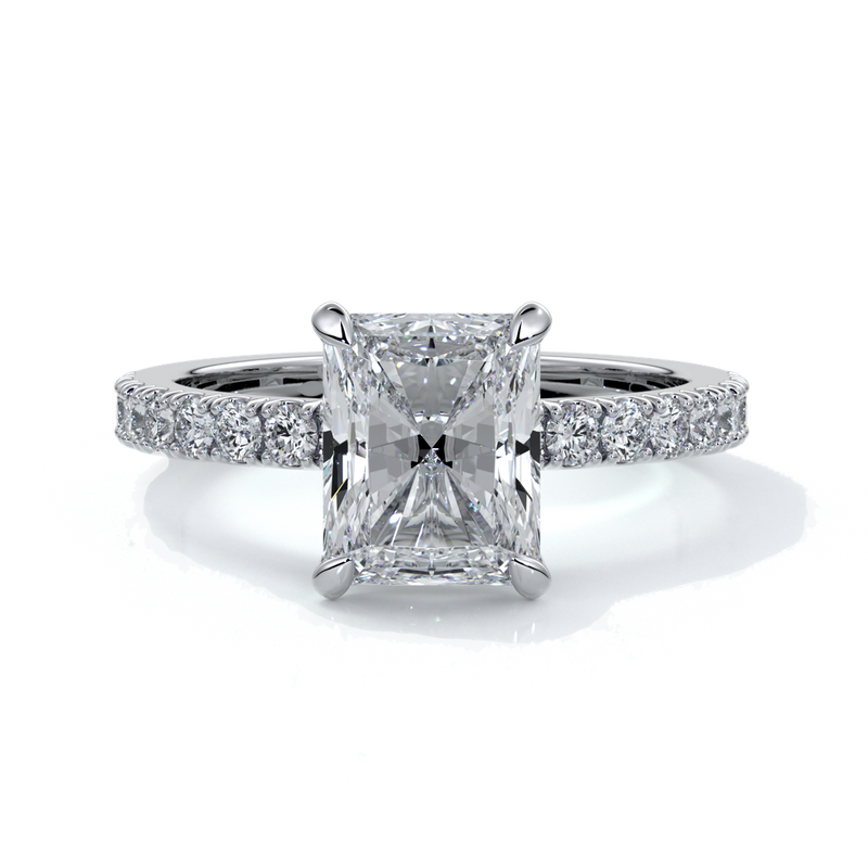 Platinum rig with a two carat radiant cut diamond with a scalloped diamond band