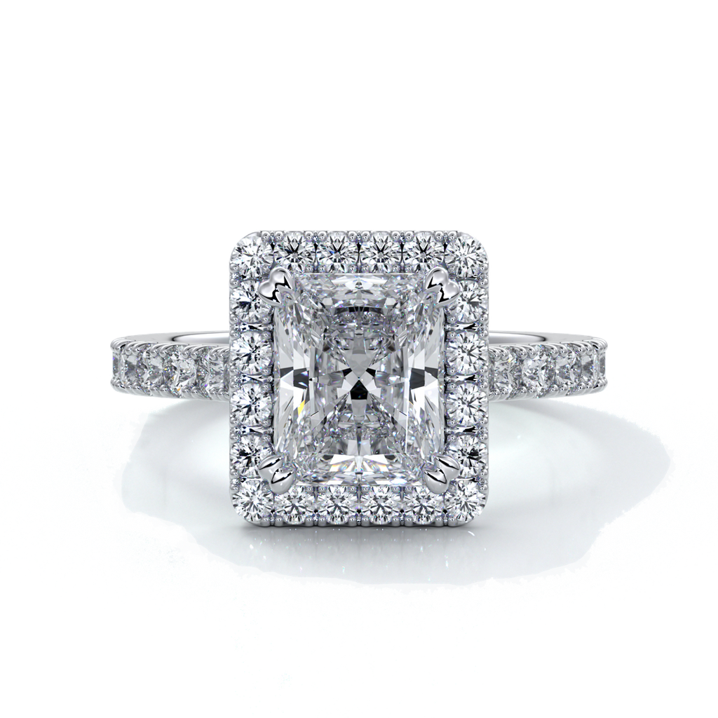 Platinum ring with a two carat radiant cut diamond in a cathedral and halo setting, with shoulder diamonds