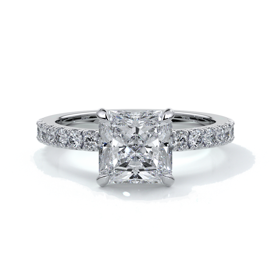 Platinum ring with a two carat square-cut radiant diamond enhanced with a scalloped diamond band