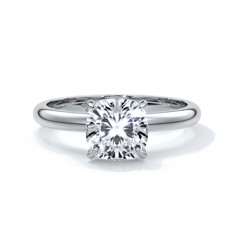 Platinum ring with a two carat cushion cut diamond secured in four claws