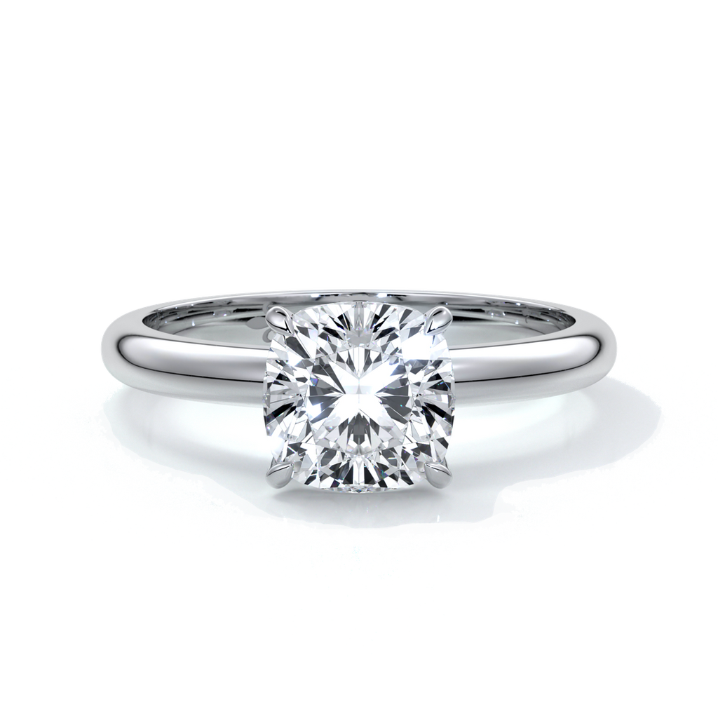 Platinum ring with a two carat cushion cut diamond secured in four claws