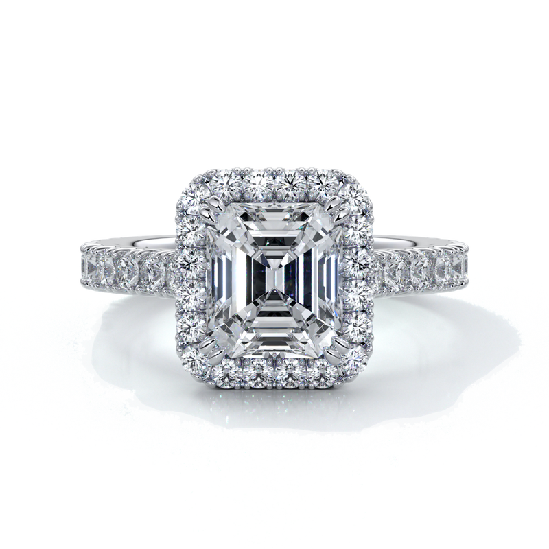 Platinum eighteen carat halo diamond ring, with cathedral setting in white gold
