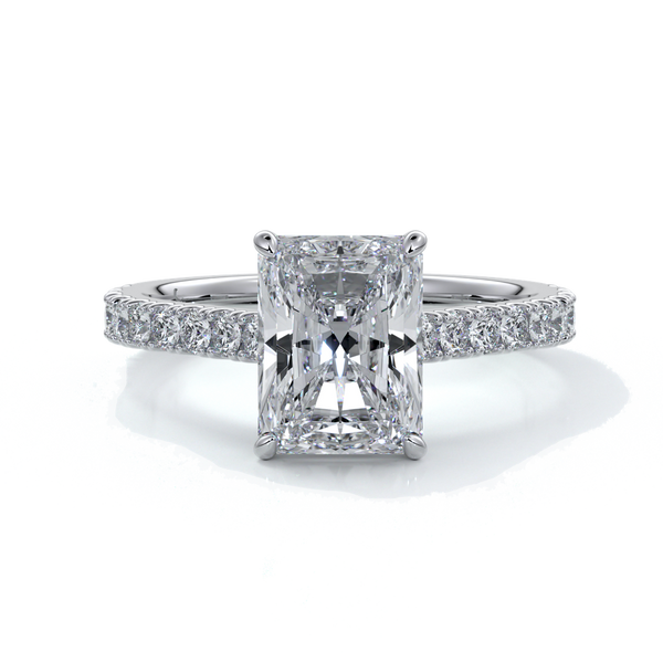 Ring with radiant cut diamond enhanced in a cathedral setting with a scalloped diamond band, cast in platinum