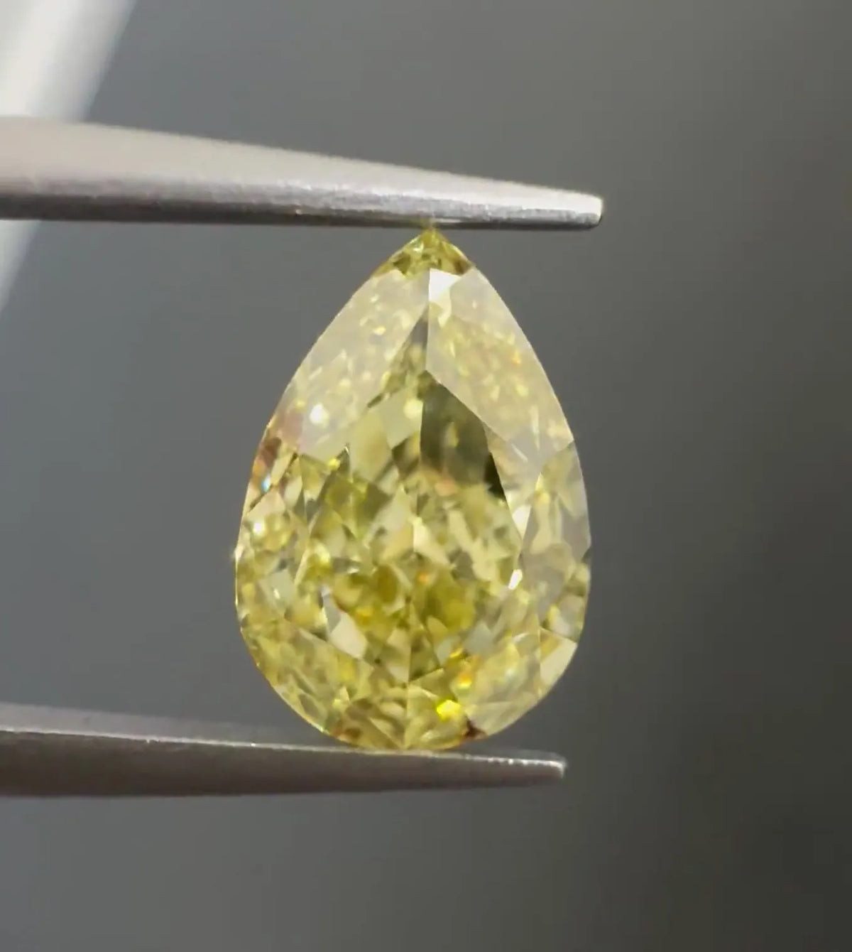 1.57ct Pear Natural Diamond (Colour Fancy Yellow, Clarity SI1, GIA Certified)