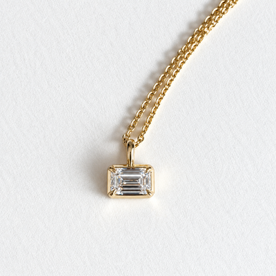 Cascade emerald cut lab diamond pendant in 9K yellow gold