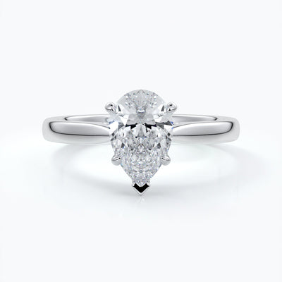 Silver ring with a pear-shaped diamond