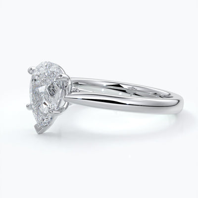 Silver ring with a pear-shaped diamond