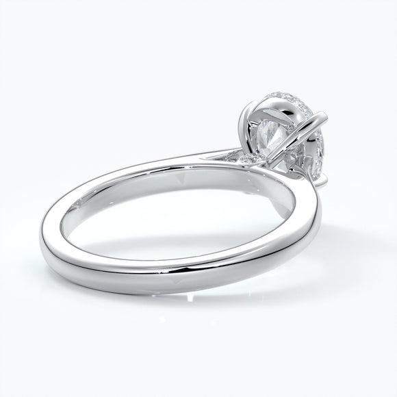 Silver ring with a pear-shaped diamond