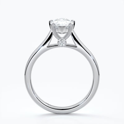 Silver ring with a pear-shaped diamond