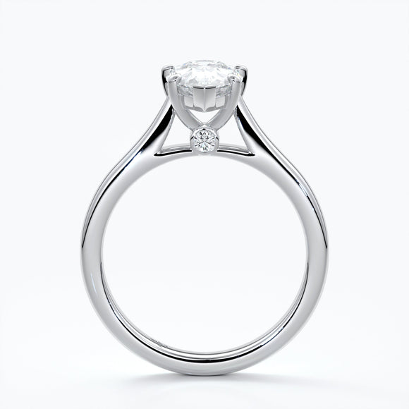 Silver ring with a pear-shaped diamond