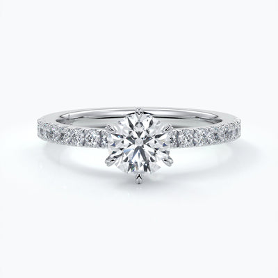 Platinum diamond ring with diamonds on the shoulders