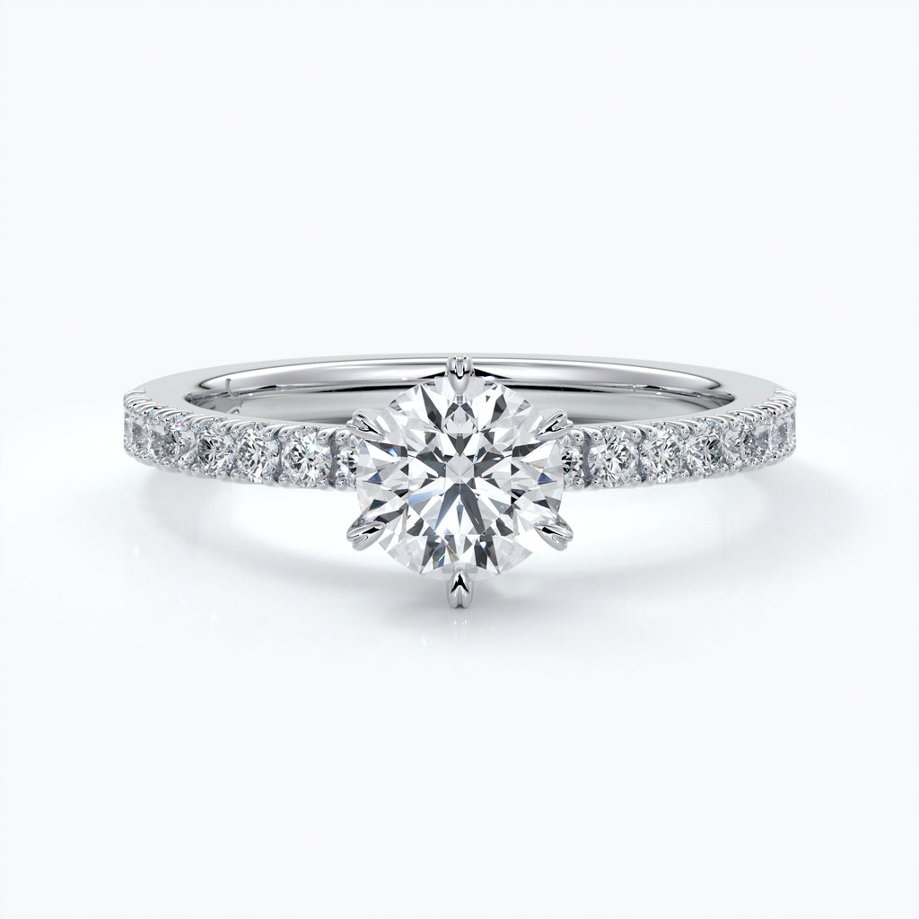 Platinum diamond ring with diamonds on the shoulders