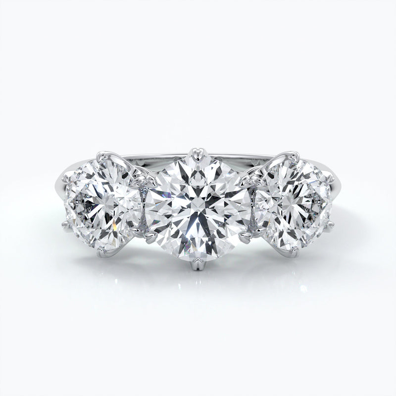 Platinum trilogy diamond ring with six claw setting