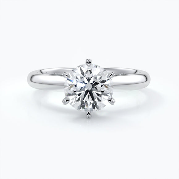 Platinum ring with two carat round diamond secured in six claws and enhanced with a Platinum band