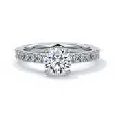 Platinum ring with round diamonds and diamonds on the band