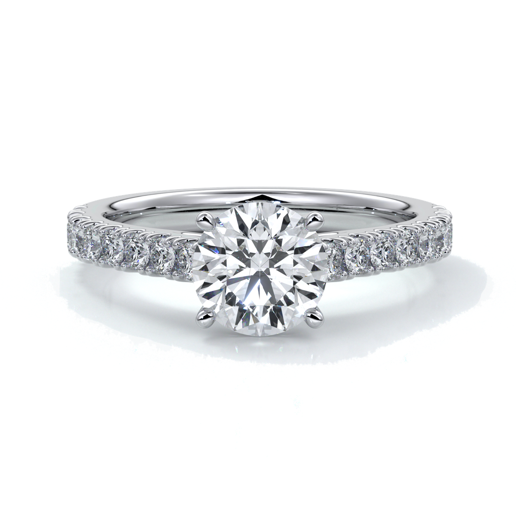 Platinum ring with round diamond secured with four claws with diamonds on the shoulders