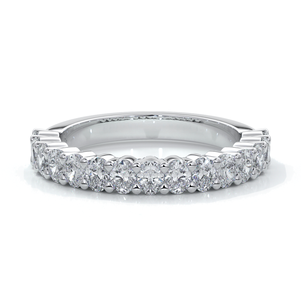 Platinum women's wedding band with 3mm x 2mm oval cut diamonds in a scalloped setting