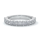 Platinum women's wedding band with 3mm x 2mm oval cut diamonds in a scalloped setting
