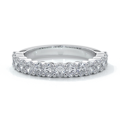 Platinum women's wedding band with 3mm x 2mm oval cut diamonds in a scalloped setting