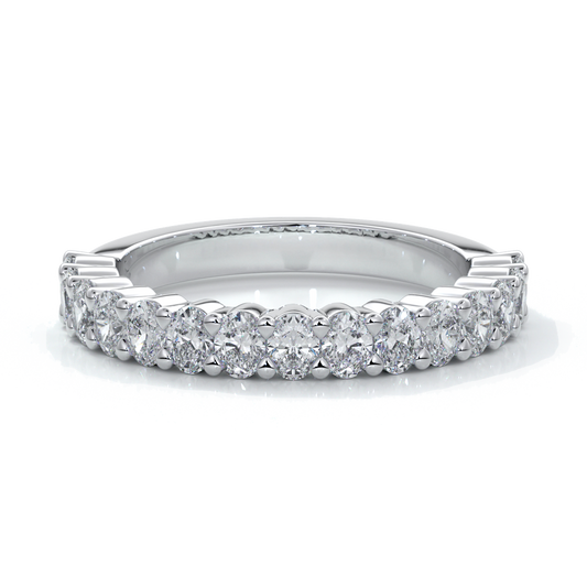 Platinum women's wedding band with 3mm x 2mm oval cut diamonds in a scalloped setting