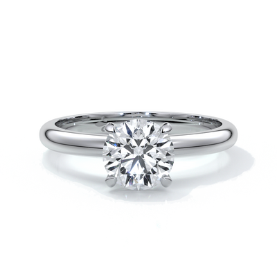 Platinum band with circle diamond secured by four claws