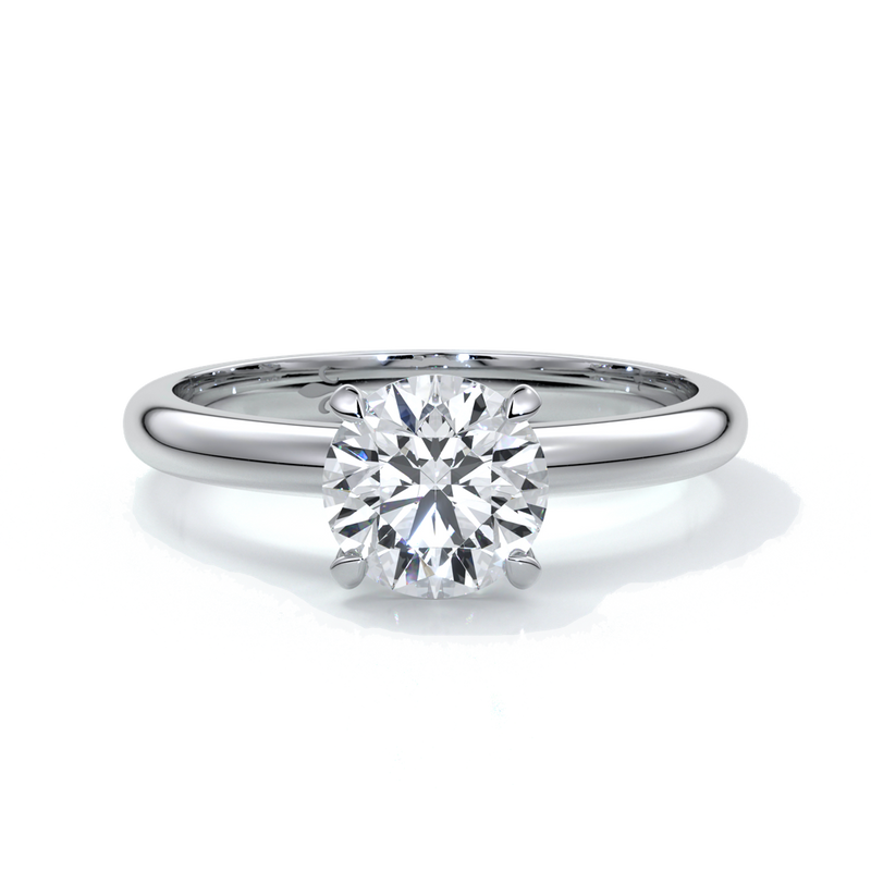 Platinum band with circle diamond secured by four claws