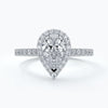 Platinum one carat pear cut halo diamond ring set with double claw with shoulder diamonds