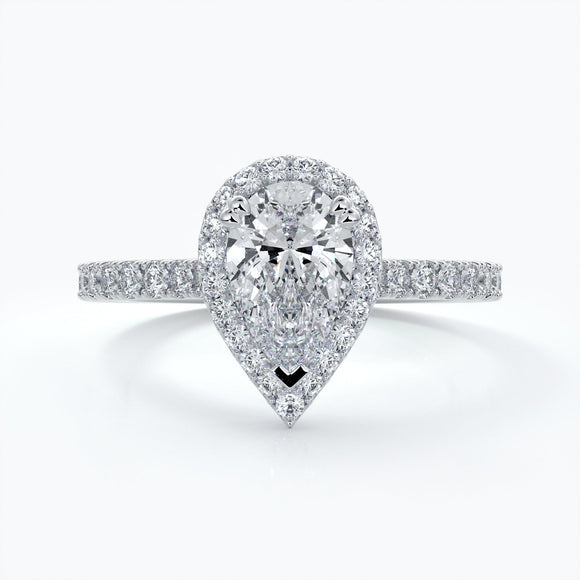 Platinum one carat pear cut halo diamond ring set with double claw with shoulder diamonds