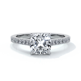 Platinum cathedral style band with a one and a half carat cushion cut diamond set in four claw platinum setting with shoulder diamonds