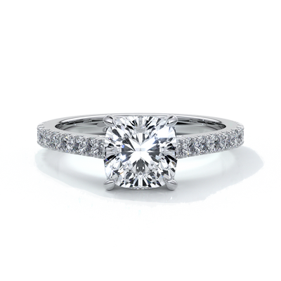 Platinum cathedral style band with a one and a half carat cushion cut diamond set in four claw platinum setting with shoulder diamonds