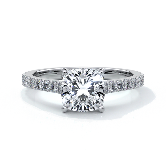 Platinum cathedral style band with a one and a half carat cushion cut diamond set in four claw platinum setting with shoulder diamonds