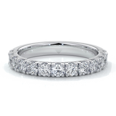 Women's wedding band with 2.5mm round scallop cut diamonds in a scalloped setting