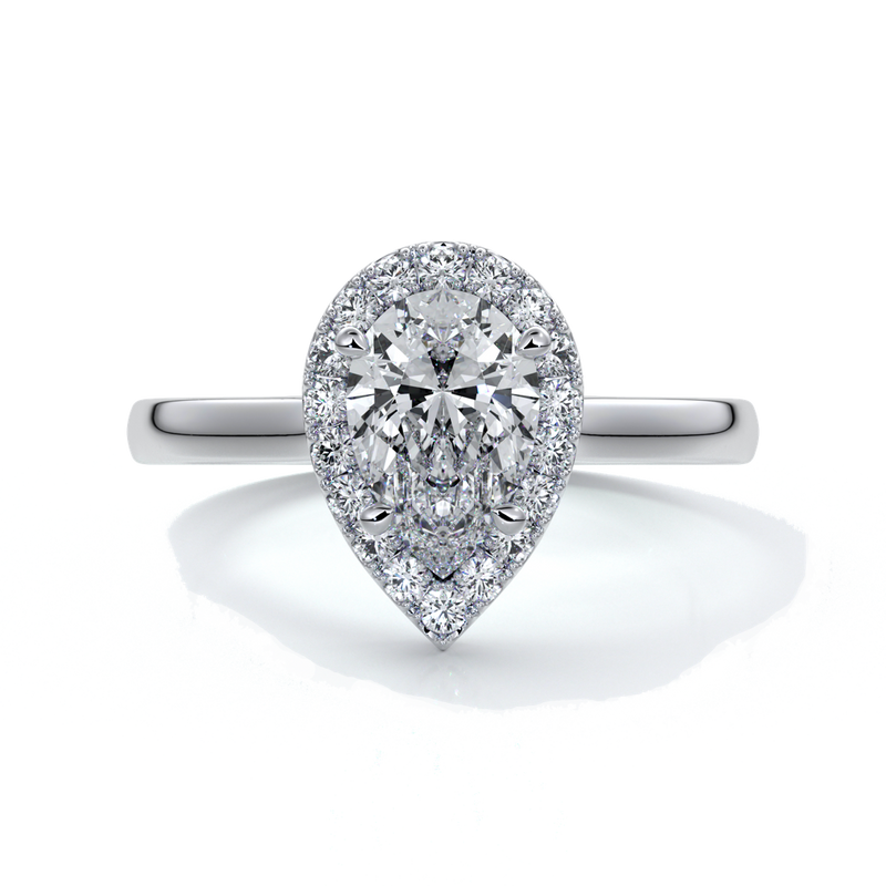 Platinum ring with a one carat pear cut diamond in a cathedral halo setting with a slim band