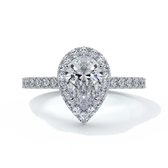 Platinum ring with a one carat pear cut halo diamond set in a double claw with cathedral setting and shoulder diamonds