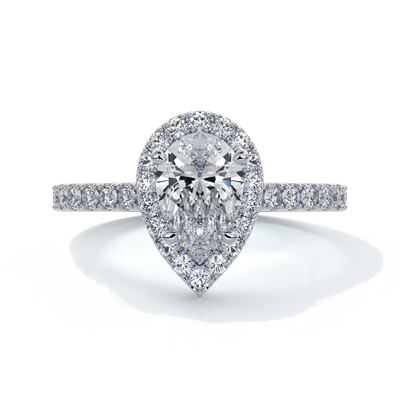 Platinum ring with a one carat pear cut halo diamond set in a double claw with cathedral setting and shoulder diamonds