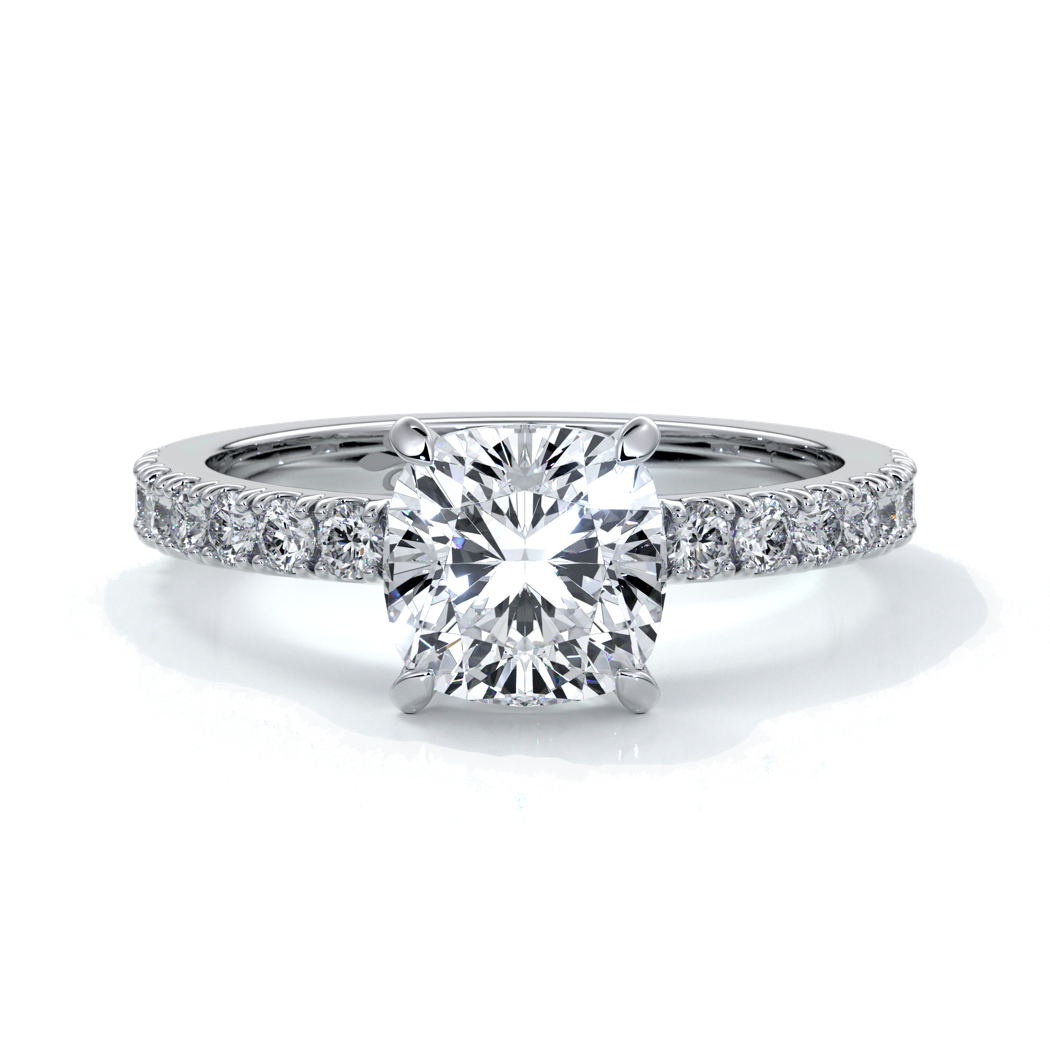 Platinum ring with cushion cut one and a half carat diamond secured with four claws and diamonds on the shoulder