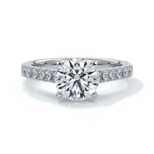 Platinum ring with round diamond secured with four claws in a cathedral setting with shoulder diamonds