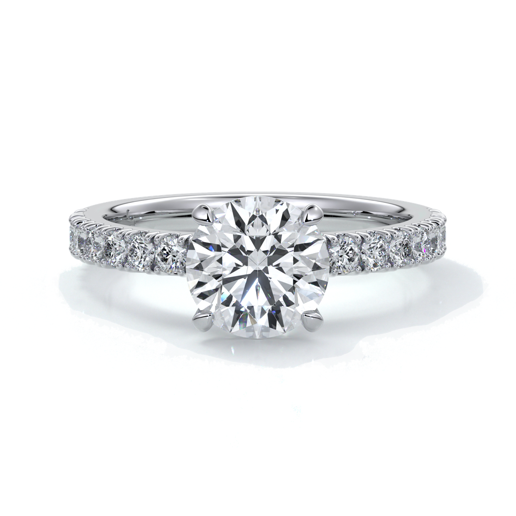 Platinum ring with round diamond and a scalloped diamond band