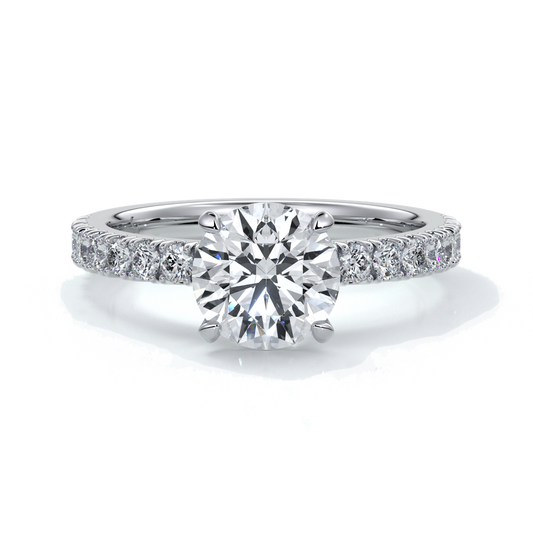 Platinum ring with round diamond and a scalloped diamond band