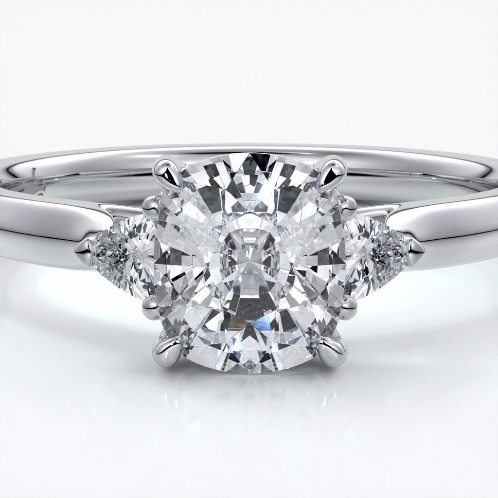 Caitlin Engagement ring cushion diamond trilogy cathedral 18ct white gold