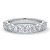Women's wedding band with 3mm round scallop cut diamonds in a scalloped setting