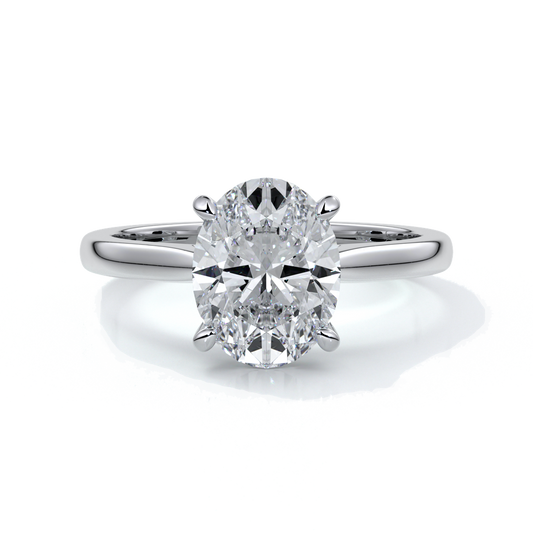 Platinum band with oval diamond secured with four claws